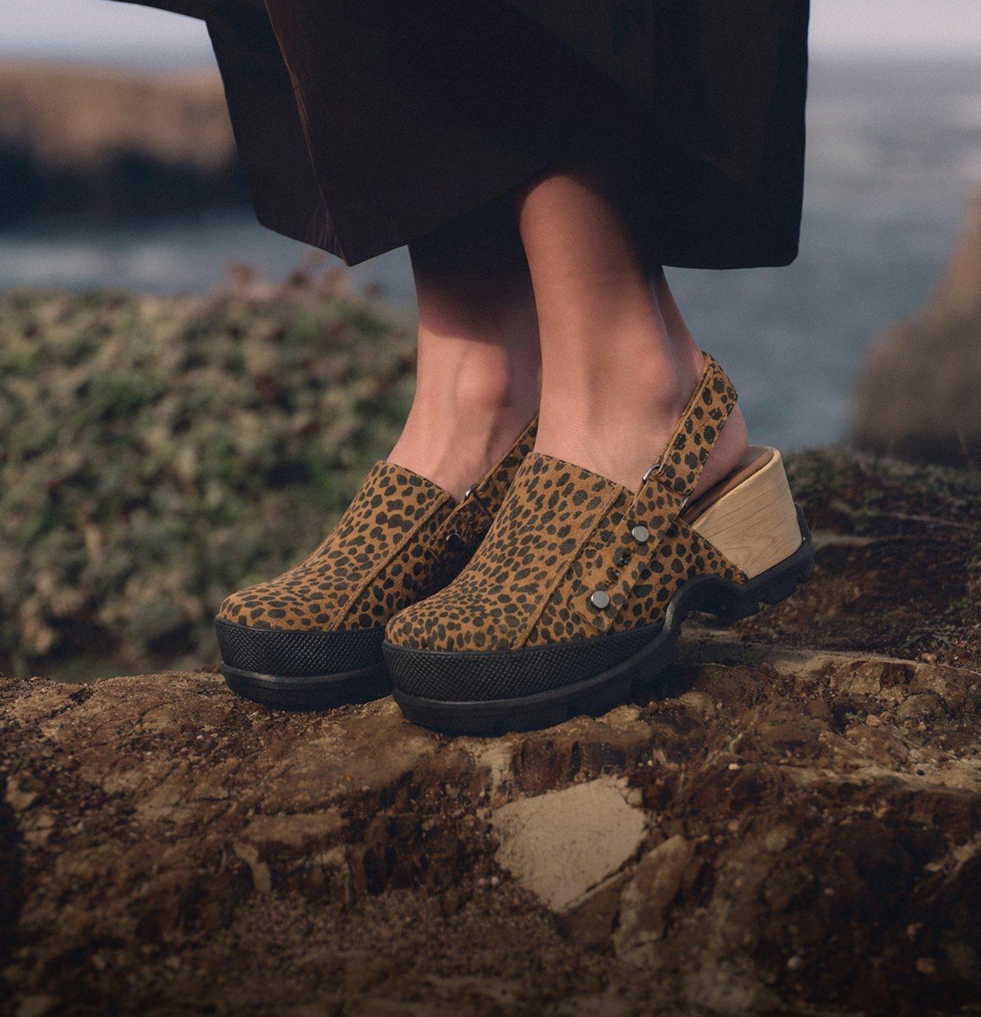 spotty clogs on rocks